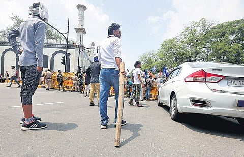 Bhim Sena activists blocked Connaught Place outer circle over demolition of Ravidas temple. (Photo | EPS, Shekhar Yadav)