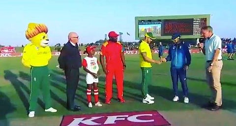 Faf du Plessis gives the coin to JP Duminy. (Photo | Instagram/Fafdup)