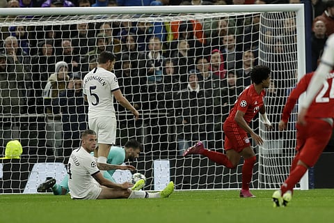 Bayern's Serge Gnabry, right, celebrates after scoring his side's third goal. (Photo | AP)