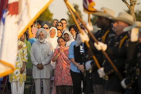 The family of Harris County Deputy Sandeep Dhaliwal watches as an honor guard begins a vigil to honor Dhaliwal at Harris County Deputy Darren Goforth Park in northwest Houston, Monday, Sept. 30, 2019.  | (File | AP)
