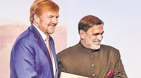 King Willem Alexander releases the first copy of the book authored by Venu Rajamony