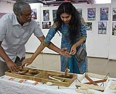 Visitors explores different photographs of Mahatma Gandhi at Culture Centre of Vijayawada and Amaravati (Photo |EPS)