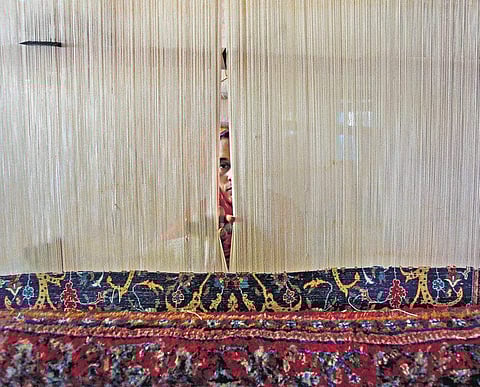 'Post GST, traders found they could not earn the money spent on making a single carpet even at 5% tax. ( Photo | EPS )