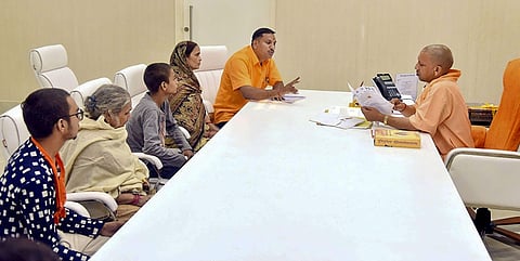 Family members of the slain Hindu Samaj Party chief Kamlesh Tiwari meet Uttar Pradesh Chief Minister Yogi Adityanath at his residence in Lucknow. (Photo | PTI)