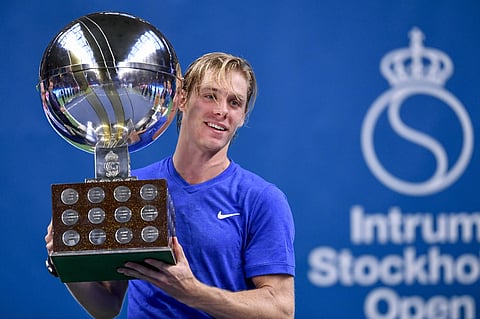 Denis Shapovalov of Canada, holds the trophy after winning the Stockholm Open tennis tournament men's single final at the Royal Tennis Hall in Stockholm, Sweden. (Photo | AP)