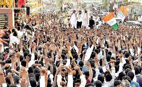 ) TPCC chief Uttam Kumar Reddy and MP Revanth Reddy hold a roadshow at Huzurnagar on Saturda