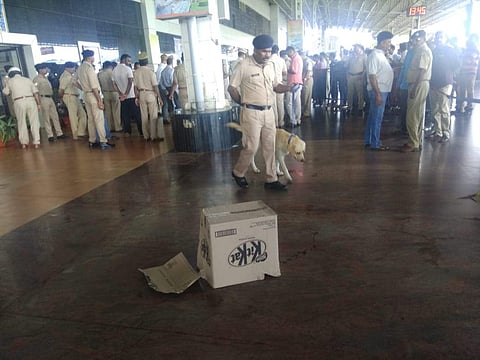 Police cover a carton on the blast material at the Hubballi Railway Station (Photo | D Hemanth, EPS)