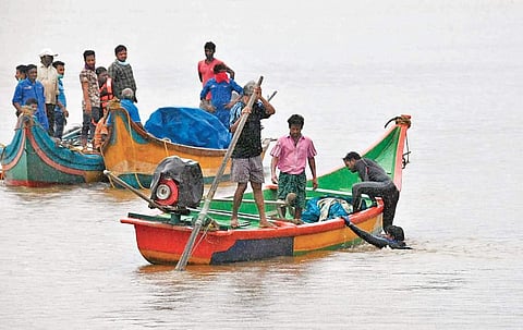 Scuba divers come back to the boat after locating Royal Vasishta in River Godavari at Kachaluru in Devipatnam mandal of East Godavari district on Sunday. Marine experts say the boat will be retrieved by Monday or Tuesday | EXPRESS