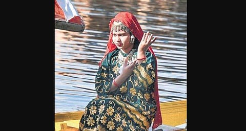 A tourist on a shikara in an empty Dal Lake in the Valley. (Photo  | PTI)