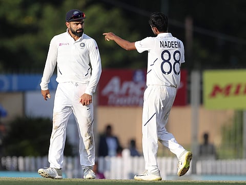 India's Shahbaz Nadeem, right, interacts with captain Virat Kohli. (Photo | AP)