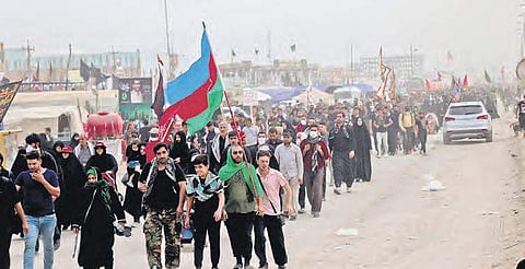 Pilgrims on their way to Imam Hussain’s holy shrine in Karbala, Iraq