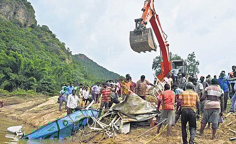 Top cover of Royal Vasishta boat being pulled out from River Godavari at Kachaluru of East Godavari on Monday | Express