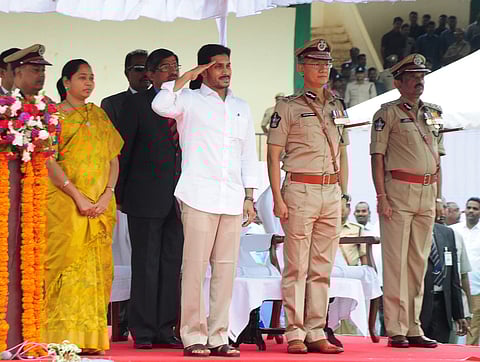 Andhra Pradesh CM YS Jagan Mohan Reddy salutes martyrs who sacrifisied their lives during Police Commemoration Day event at Indira Gandhi Municipal Stadium in Vijayawada on Monday (Express photo by Prasant Madugula)
