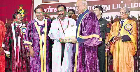 Actor Charle receiving his doctorate from Governor Banwarilal Purohit. Also seen is Minister for Tamil Official Language and Tamil Culture  K Pandiarajan | Express