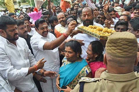Chief minister Edappadi K. Palaniswami distributes sweets at AIADMK party office. (Photo | Ashwin Prasath, EPS)
