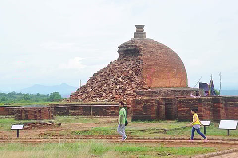 Tourists visit 2000 year old Maha Stupa, which was collapsed in heavy rain,  at Thotlakonda in Visakhapatnam on Thursday. (Photo | G Satyanarayana, EPS)