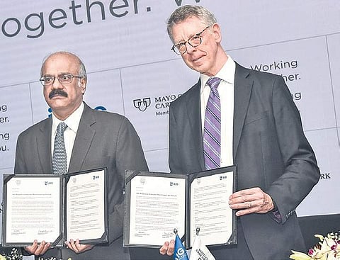 AIG Hospital chairman Dr D Nageshwar Reddy and Mayo Clinic Care Network medical director Dr David Hayes with the Memorandum of Understanding, at the AIG Hospital in Gachibowli of Hyderabad on Thursday | Vinay Madapu