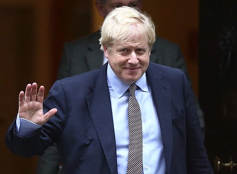 UK Prime Minister Boris Johnson leaves 10 Downing Street, on his way to parliament in London (Photo| AP)