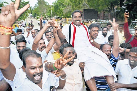 Supporters of V Narayanan celebrating the AIADMK’s victory in Nanguneri by-election  on Thursday | V Karthikalagu