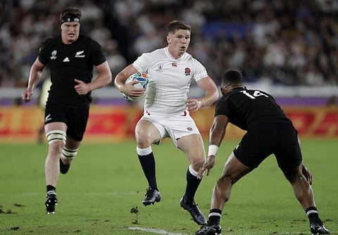 England's Owen Farrell runs at New Zealand's Sevu Reece during the Rugby World Cup semifinal at International Yokohama Stadium between New Zealand and England in Yokohama. (Photo | AP)