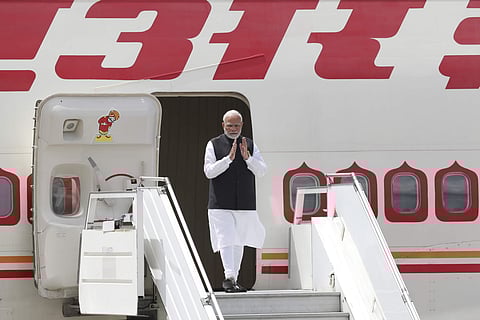 Prime Minister Narendra Modi arrives at the Ministro Pistarini international airport. (File photo| AP)