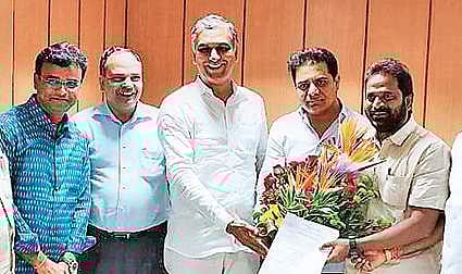 Ministers T Harish Rao, KT Rama Rao and V Srinivasa Goud after releasing Neera policy and guidelines for its sale in Hyderabad on Monday