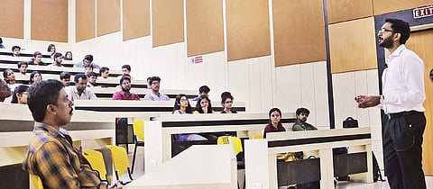 Hari Prasad speaking at a stock trading session