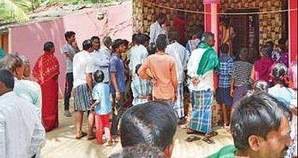 Villagers gather in front of the residence of Manjappa Hanumantappa Olekar on Wednesday | D Hemanth