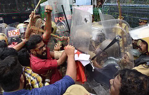 Police push away AISF activists who protested in front of the Secretariat demanding a re-investigation into the death of the two Dalit siblings at Walayar in Palakkad. (Photo | BP Deepu, EPS)