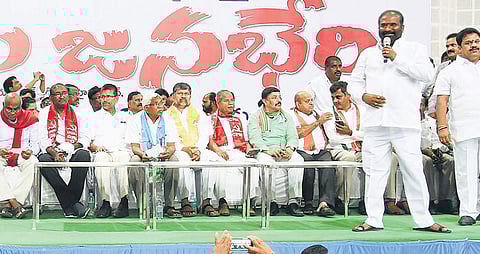 (From top) Hundreds gather at Saroornagar Indoor Stadium in Hyderabad on Wednesday to take part in the public meeting ‘Sakala Janula Samarabheri’, organised by the RTC JAC; union leader Ashwathama Reddy addresses the gathering | Vinay Madapu