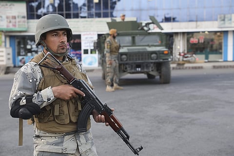 Afghan soldiers stand guard near a polling station in Kabul, Afghanistan, Saturday, Sept. 28, 2019. | (Photo | AP)