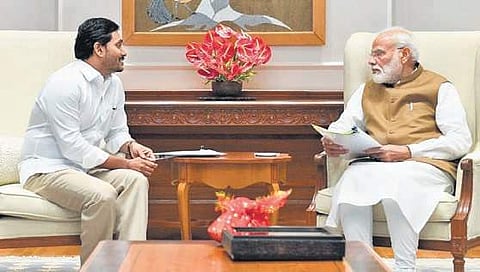 Prime Minister Narendra Modi is all ears as CM YS Jagan Mohan Reddy explains financial assistance the State needs from Centre in New Delhi on Saturday. (Photo | EPS)