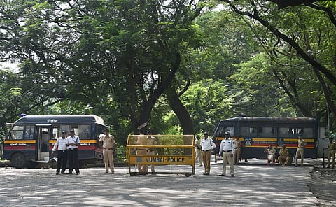 Police cordon off the area following a protest against the tree-cutting being carried out for the Metro car shed project at Aarey colony in Mumbai. (Photo | PTI)