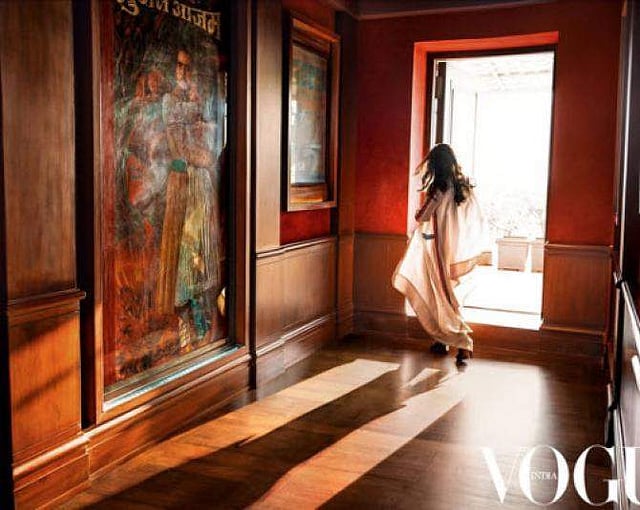 Some of Gauri's favourites from the collection she picked up for her home include: a jade Ganpati, a pair of four-foot-tall black vases from Paris, a life-sized marble Radha-Krishna sculpture and a huge canvas of Subhash Awchat’s reclining clown.  (Photo of Gauri Khan at Mannat | Vogue India Instagram)