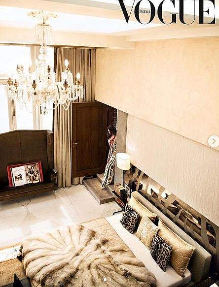 Shah Rukh's 42-seater home theatre is lined with tall vintage posters of Sholay, Mughal-E-Azam and Ram Aur Shyam, as well as Charlie Chaplin’s walking stick-framed in place.  (Photo of Gauri Khan at Mannat | Vogue India Instagram)