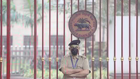 A security personnel wears a face mask as pollution levels in the Delhi-NCR region entered the 'severe-plus' category'. (Photo | Shekhar Yadav, EPS)