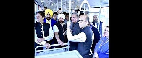 Punjab CM Amarinder Singh seen along with Pakistan PM Imran Khan on their bus ride to Kartarpur Sahib. (Photo | Screengrab)