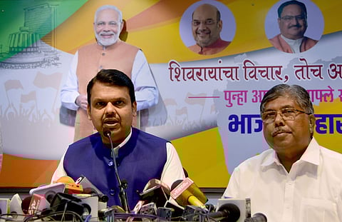 Former Maharashta chief minister Devendra Fadnavis with Maharashtra BJP president Chandrakant Patil. (Photo | PTI)