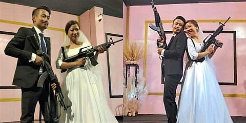 Gun-toting photos of young couple have gone viral on social media.