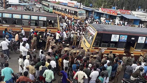 Arthanaripalayam residents staging a protest seeking the capture wild elephants, on Sunday (Photo | EPS)