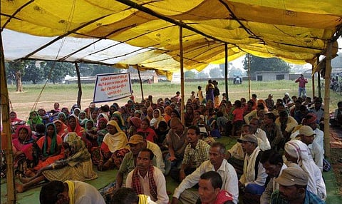 Villagers sitting on dharna at Udaipur block in Ambikapur district.