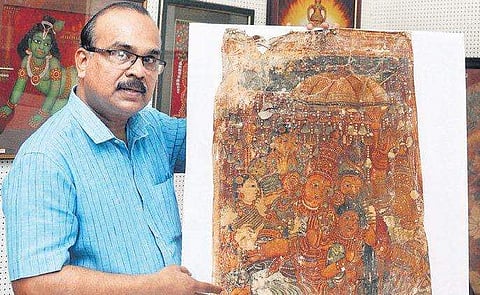 Shashi K Warier with mural painting at his art gallery in Kochi on Friday | A SANESH