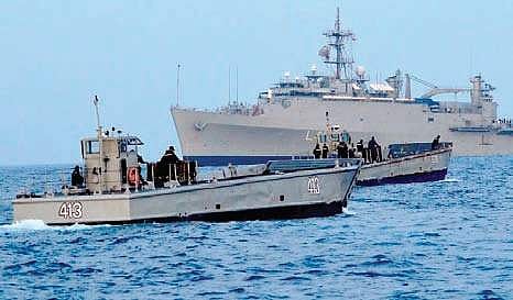 A file photo of US ships participating in an exercise | express