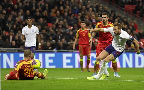 England's Harry Kane, right, scores the fifth goal during the Euro 2020 group A qualifying soccer match between England and Montenegro at Wembley stadium in London, Thursday, Nov. 14, 2019. | (Photo | AP)