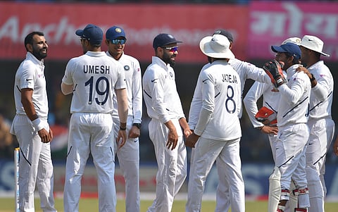 India's Mohammad Shami with teammates celebrates the wicket of Bangladesh captain Mominul Haque on day 3 of their first cricket test match in Indore Saturday Nov. 16 2019. (Photo | PT)