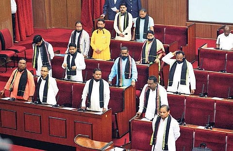BJP MLAs wear black scarf as part of their silent protest during Assembly session in Bhubaneswar on Saturday (Photo | EPS)