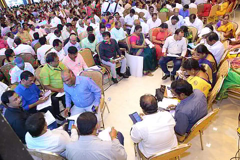 Officials take part in the group discussions of different topics related to 'SPANDANA' grievances analysis programme. (Photo | EPS)