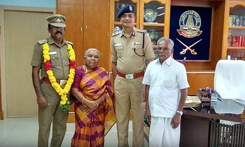 Murugan and his wife with S Sekar and Commissioner Deepak M Damor| Express