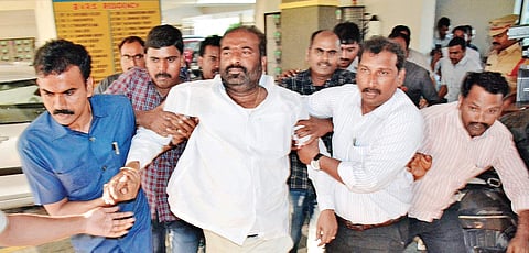 Police arrest RTC JAC convenor Ashwathama Reddy on Sunday; (bottom, right) protesters being arrested in Ashok Nagar; (below) MRPS leader Manda Krishna Madiga being taken into custody.