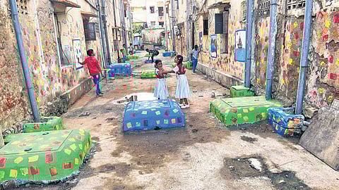 now/The street walls are now painted with cartoons of Dora, Minions, and cute little animals| Express